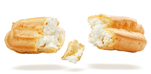 Eclair halves fly on a white isolated background. Levitating eclair