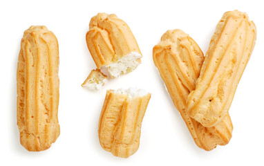 Set of eclairs whole and half on a white background, isolated. Top view