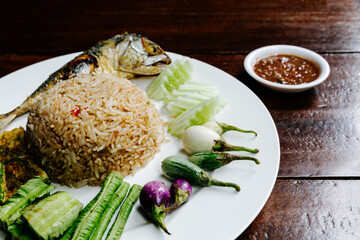 Thai food dish called Rice Mixed with Shrimp pasta  Served with mackerel and soup