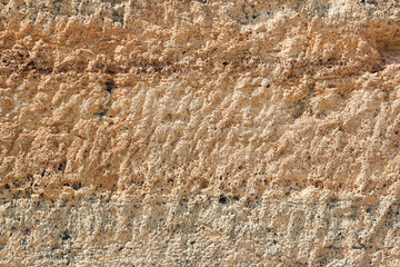 relief texture of a block in the wall of the building of the ancient city of Hierapolis