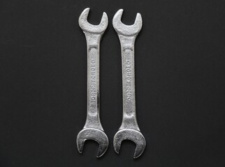 A closeup view of two spanners made of forged steel.