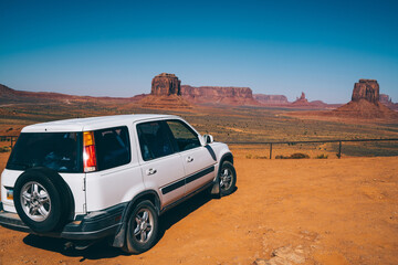Fototapeta na wymiar Modern vehicle in arid desert