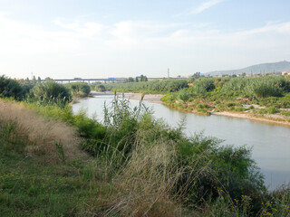 Obraz premium River Llobregat approaching the Mediterranean Sea