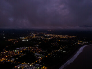Beautiful aerial view of the City cover with lights at night of Puntarenas,