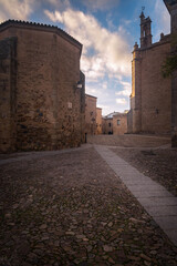 Street of the monumental old town of Cáceres city at sunset, UNESCO World Heritage City,...