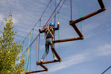 The girl is being trained in mountaineering at special children's courses. The concept of the development of sports for children and youth.