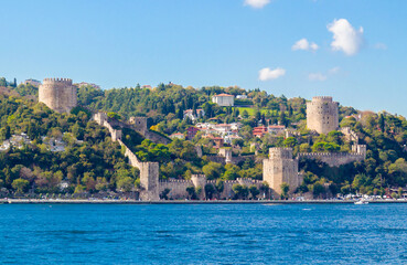 Fototapeta na wymiar View from the Bosphorus Strait to Rumelihisarı (also known as Rumelian Castle and Roumeli Hissar Castle) in Istanbul, Turkey