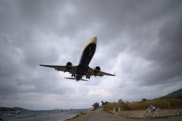 Fototapeta na wymiar 9/14/2020 Greece, Skiathos island, airport. Dangerous plane landing.