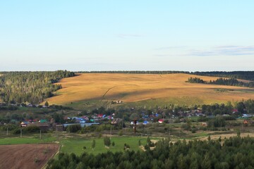 Fototapeta na wymiar Bird's eye view of the village and farmland