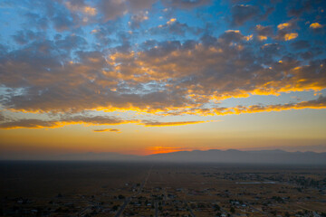 teal and orange sunset over the city