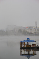 city embankment in the fog