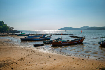 Fototapeta na wymiar Amazing view on fishing boats and water in fishing village in Kumta district of South India .