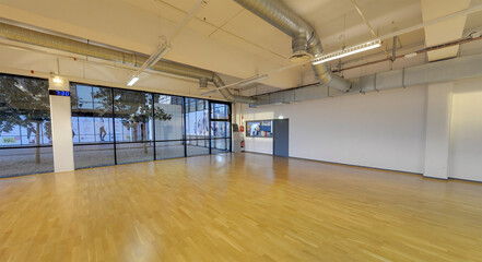 Interior of an empty fitness hall for fitness, dancing, pilates, gym lessons