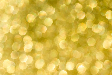 abstract yellow bokeh background from glitter