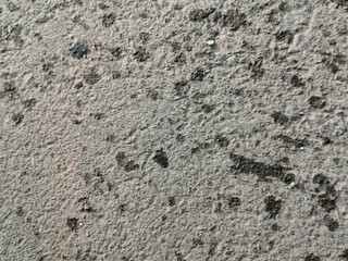the texture of the wet asphalt