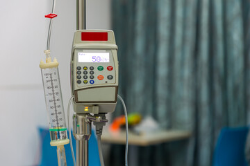 Saline infusion pump. Infusion Pump and Syringe Pump. Infusion pump in the hospital.