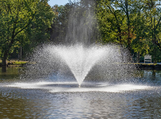 Fototapeta na wymiar Park water fountain on a sunny day