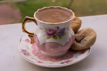 Traditional Turkish coffee and dried figs on the balcony