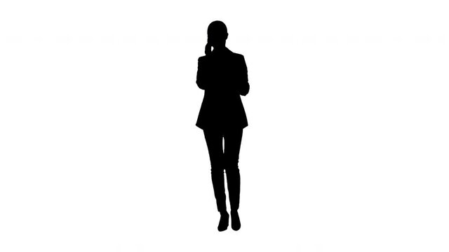 Silhouette Bossy Businesswoman talking on her phone.