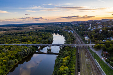 panoramic view of the motorway across the river against the backdrop of a green forest