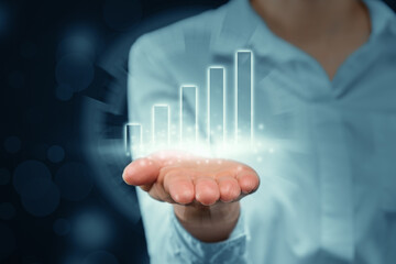 Person abstractly projects columns with business growth