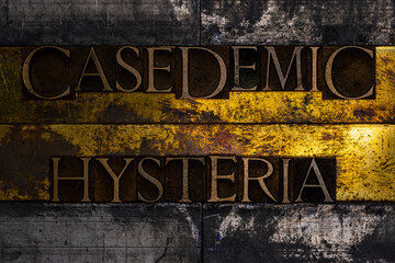 Casedemic Hysteria text message on textured grunge copper and vintage gold background
