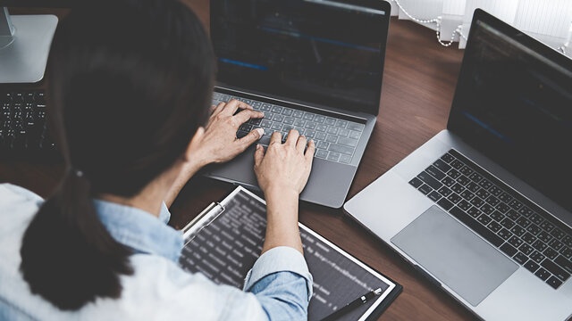 Programmer working in a software development and coding technologies. Website design. Technology concept.