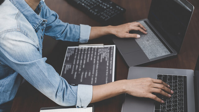 Programmer working in a software development and coding technologies. Website design. Technology concept.