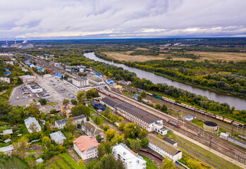 panoramic view of the motorway across the river against the backdrop of a green forest