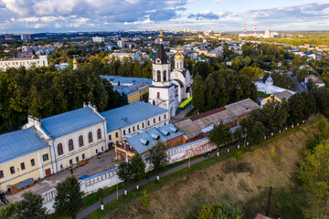 Fototapeta na wymiar a panoramic view of the old city district with ancient buildings and a church filmed from a drone