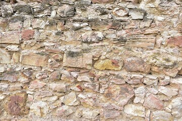 stone wall background in castle ruins

