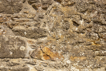 Texture of an old wall made of stones - background photo