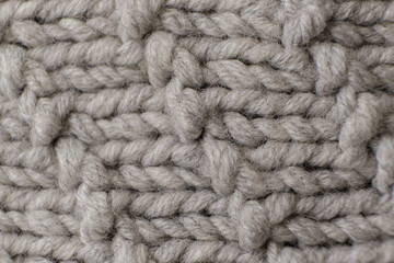 Handmade grey knitting wool texture background close up