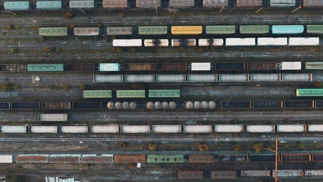 Top view of freight transportation rail cars, delivery services, infrastructure