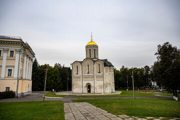 old white stone church on a hill in the old town