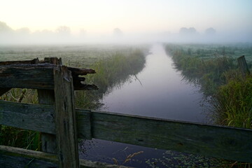 Fence, Brook and Pasture on a Foggy Morning