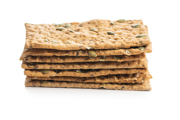 The  crispy bread with pumpkin seeds. Knackebrot on white background.