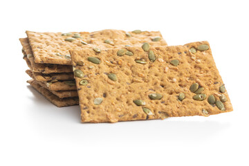 The  crispy bread with pumpkin seeds. Knackebrot on white background.