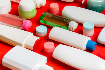 Group of plastic bodycare bottle Flat lay composition with cosmetic products on colored background empty space for you design. Set of White Cosmetic containers, top view with copy space