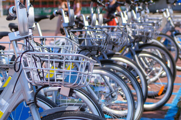 Bicycle parking in the city. A row of bicycle baskets close up. Copy space