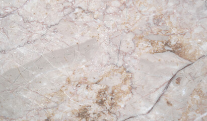 Obraz na płótnie Canvas natural marble with beige and brown veins on a white background