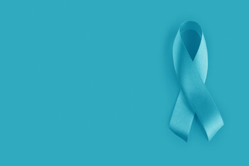 Blue ribbon on background. Prostate cancer awareness month. Blue ribbon symbol of world prostate...