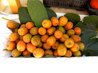Fresh ripe whole Prickly Pears on the table of a street seller in Torres Vedras, Portugal.  