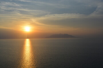 Obraz na płótnie Canvas Sunset pleasure towards Samothraki island(Photo taken from Kaleköy / Gökçeada / Çanakkale / Turkey)