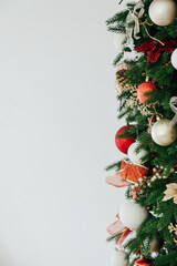 Christmas tree with gifts of garland lights for the new year as a white background