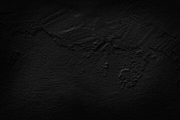 Beautiful black cement wall plastered surface background and texture pattern. Blank concrete dark rough wall for background.