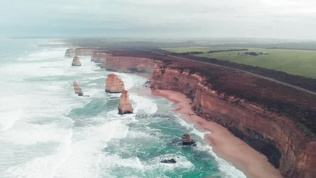 Amazing aerial view of Twelve Apostles cliffs on a coudy afternoon