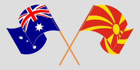 Crossed and waving flags of North Macedonia and Australia