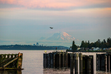 General view of Kingston, Washington ferry dock over the Puget Sound with Mount Rainier under the...