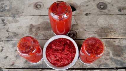 The tomato sauce made with traditional methods in Turkey. Natural, additive-free. in a copper pot. It is boiling over wood fire.